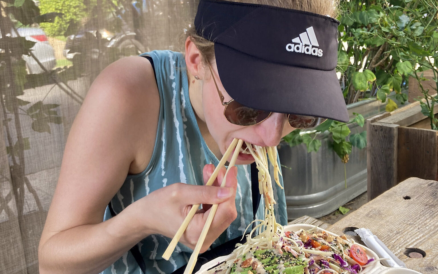 Ashley eating vegan salad