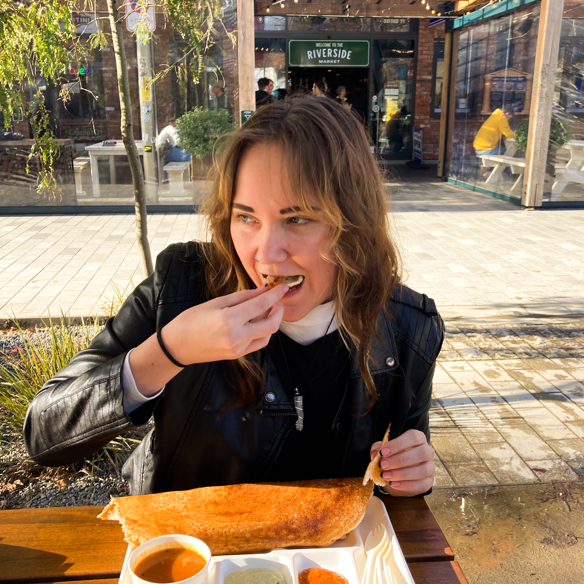 Indian Food Dosa with three curries out side at riverside market