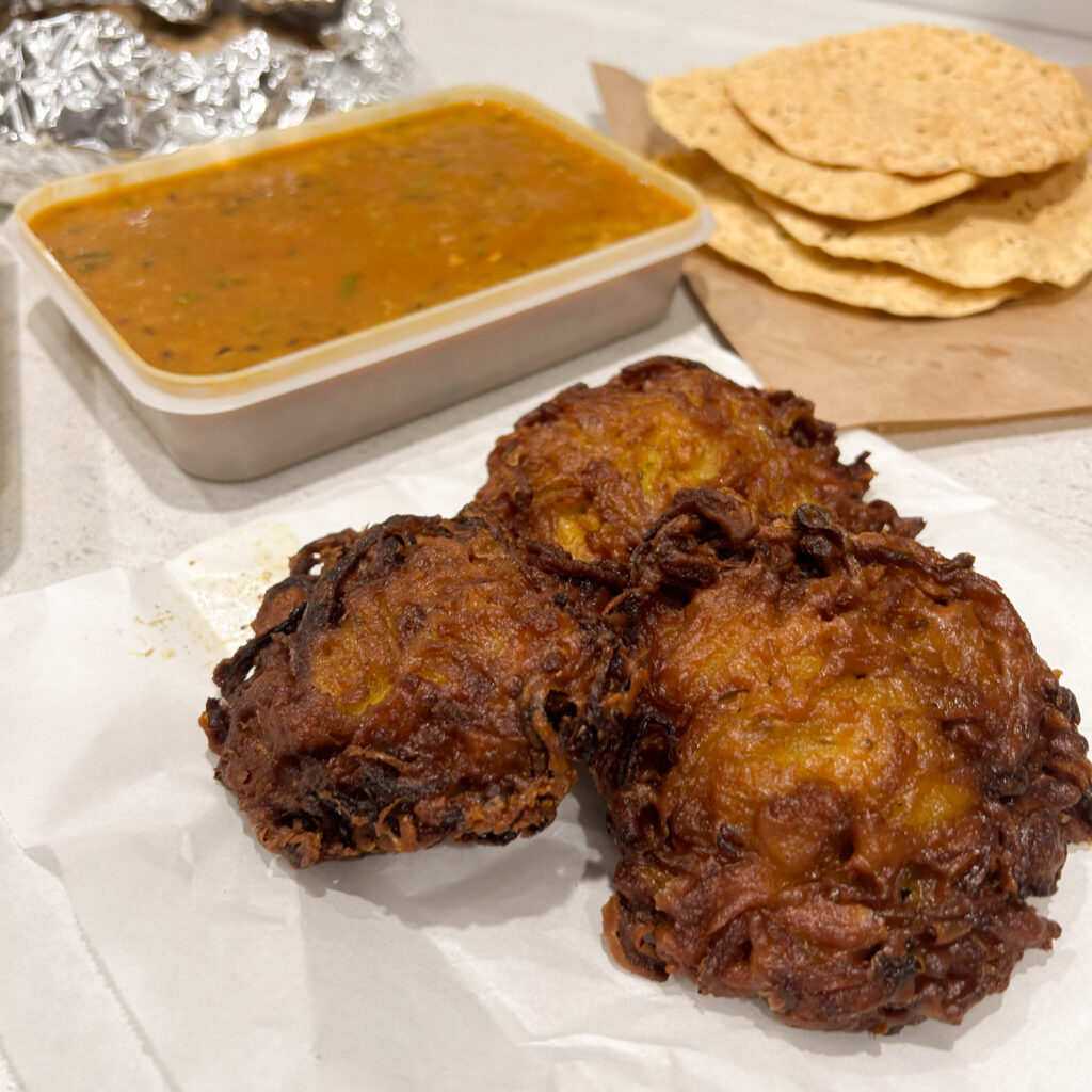 Indian Restaurants in Christchurch takeaway order of onion bhajis and dahl