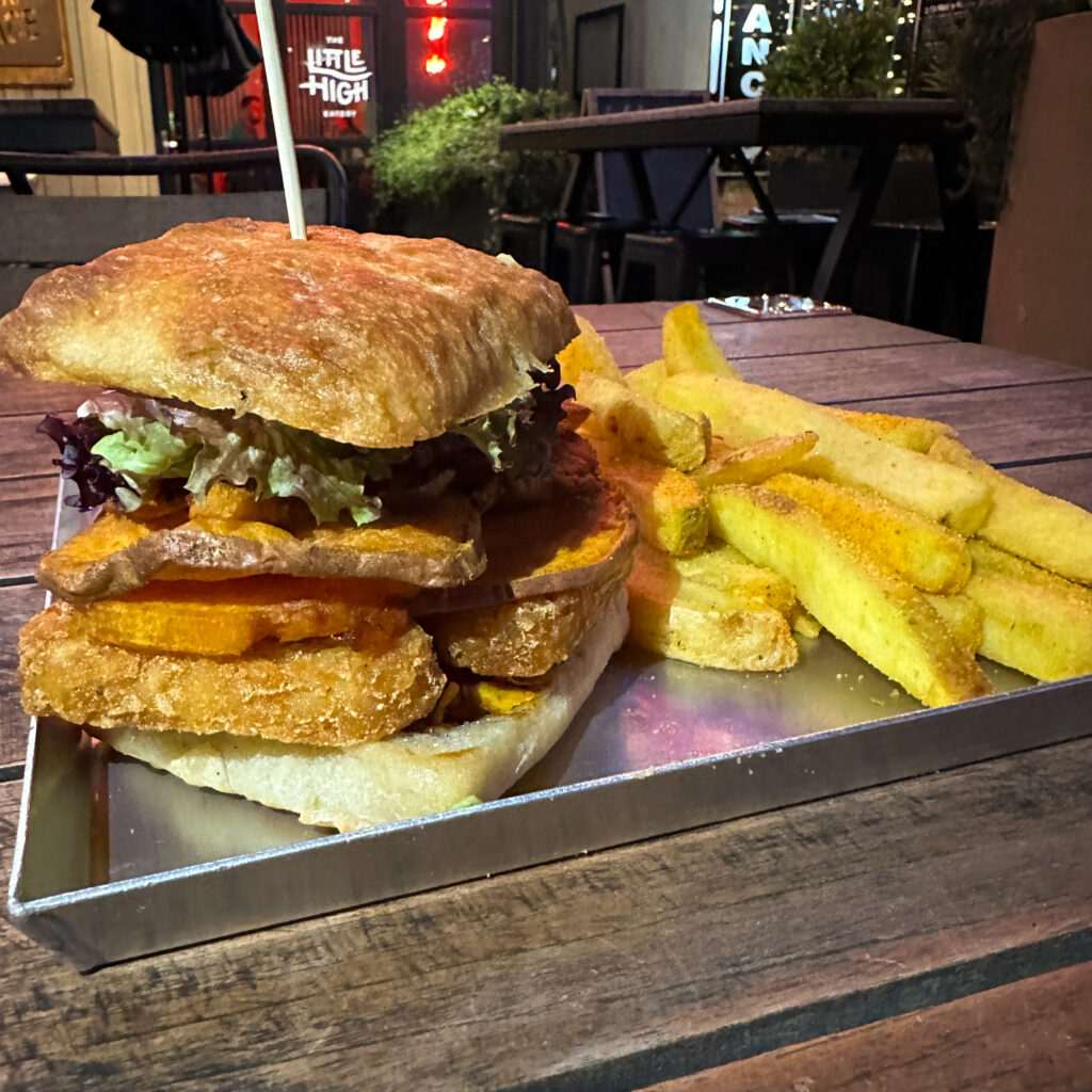 Little high eatery vegan sweet potato burger with avocado and fries from bacon bros